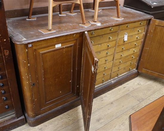 A Victorian scumbled pine collectors cabinet of drawers W.167cm